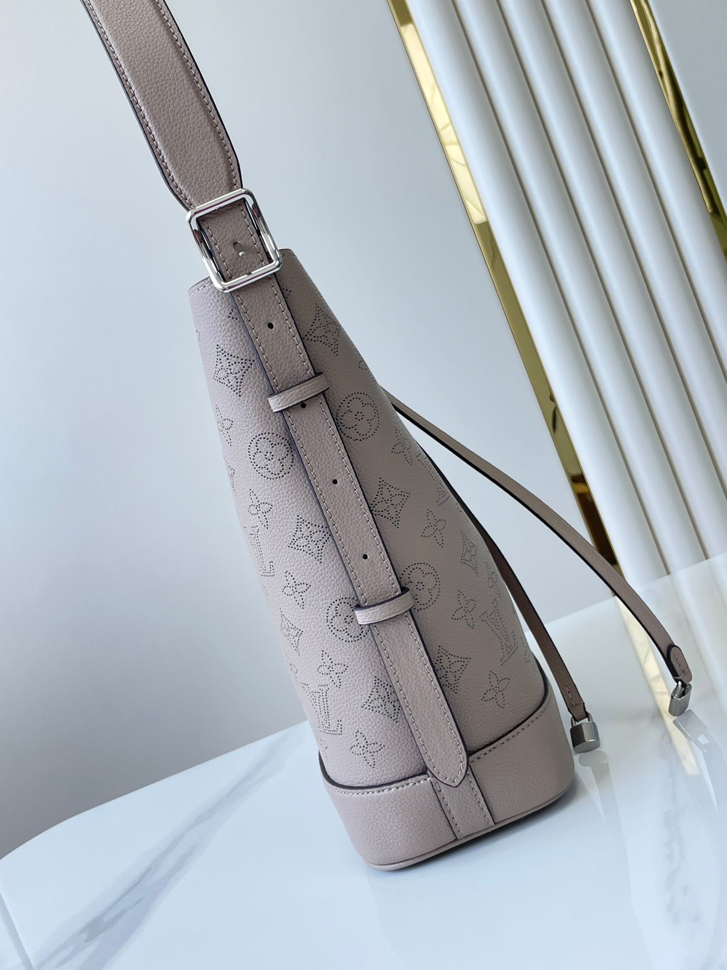 LOUIS VUITTON FLORE 28 IN GALET PERFORATED CALFSKIN