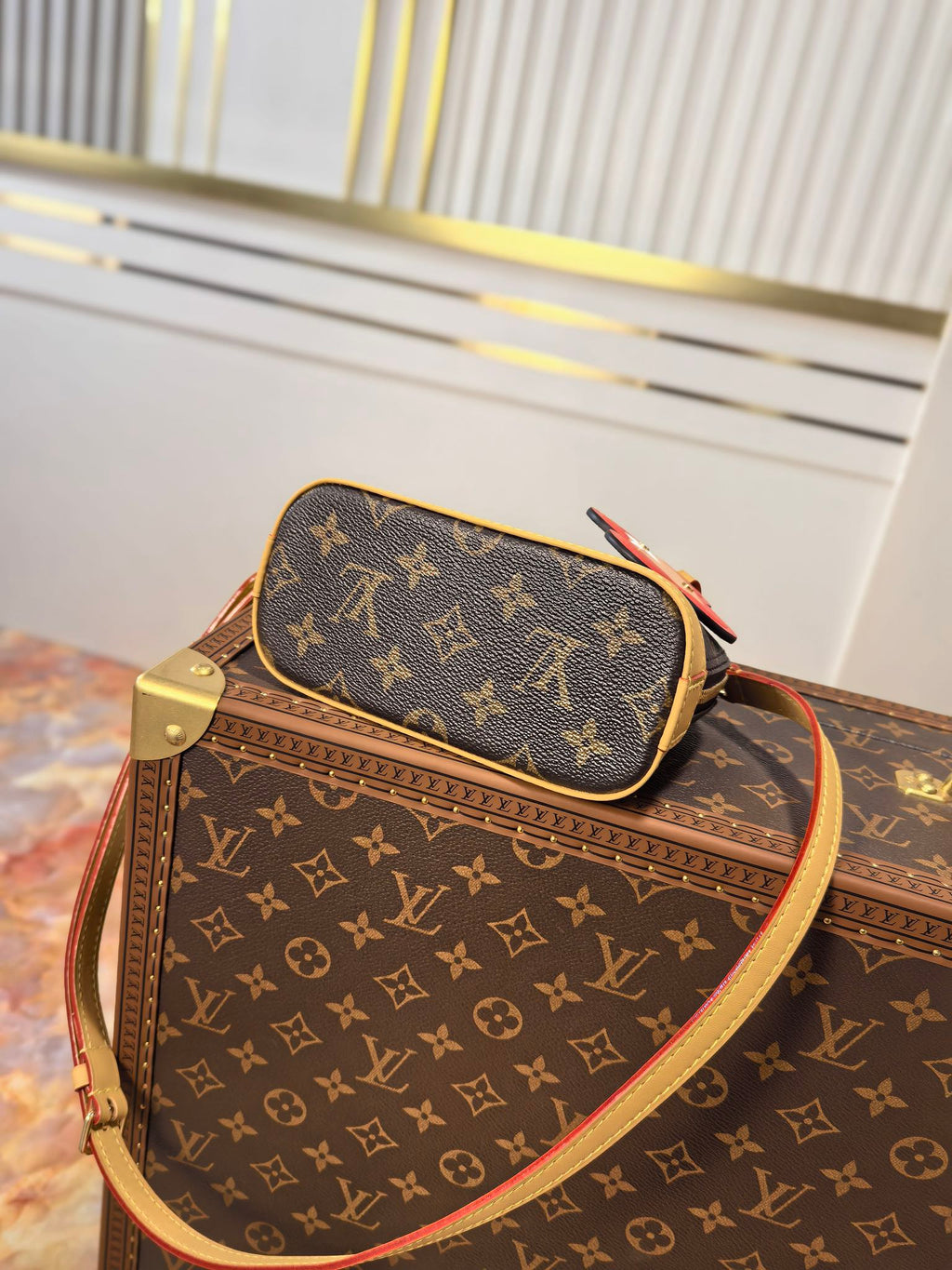 LOUIS VUITTON LV 25S NANO ALMA 18 IN BROWN MONOGRAM CANVAS PRINTED WITH THE VIVIENNE MASCOT