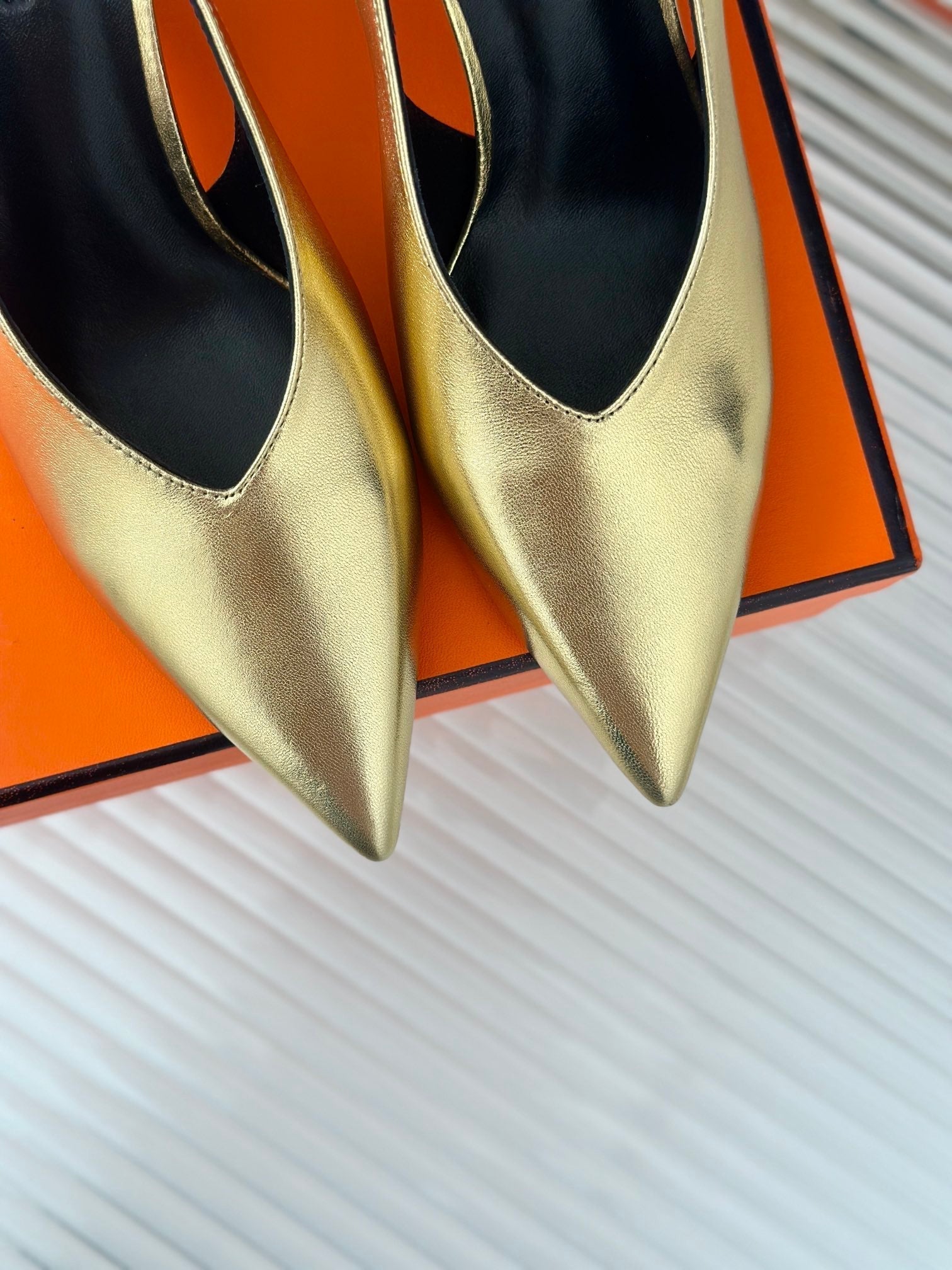 HERMES HIGH HEEL 75 MM POINTED- TOE SANDAL IN GOLD CALFSKIN
