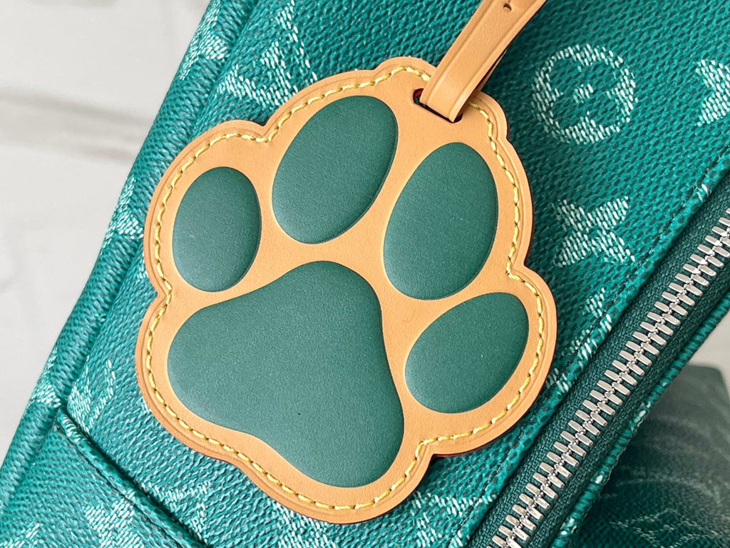 LOUIS VUITTON DISCOVERY BACKPACK 38 IN GREEN MONOGRAM HERITAGE CANVAS
