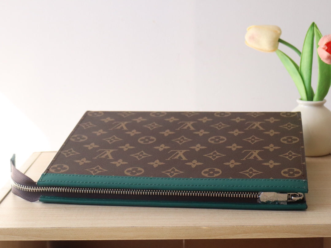 LOUIS VUITTON LV 25S POCHETTE VOYAGE 26 IN BORNEO GREEN MONOGRAM MACASSAR COATED CANVAS